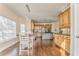 Charming kitchen with wooden cabinets, stainless steel appliances, and an island at 4213 Bretdale Nw Run, Kennesaw, GA 30152
