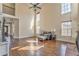 Open living room with hardwood floors, fireplace, and views of the staircase at 4213 Bretdale Nw Run, Kennesaw, GA 30152