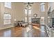 Bright living room with high ceilings, fireplace, and hardwood floors at 4213 Bretdale Nw Run, Kennesaw, GA 30152