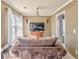 Sitting room area featuring neutral walls and a television over a dresser at 4213 Bretdale Nw Run, Kennesaw, GA 30152
