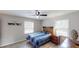 Cozy bedroom with plenty of natural light and wood-look flooring at 4244 Dorsey Sw Ct, Lilburn, GA 30047