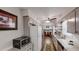 Traditional kitchen with granite countertops, stainless steel appliances and view to dining room at 4244 Dorsey Sw Ct, Lilburn, GA 30047