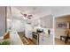 Bright kitchen features granite countertops, stainless appliances, and eat-in breakfast area at 4244 Dorsey Sw Ct, Lilburn, GA 30047