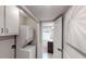 Functional laundry area with washer and dryer hookups, adjacent to bathroom at 4244 Dorsey Sw Ct, Lilburn, GA 30047