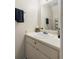 Compact bathroom features a clean vanity, round sink, and a well-lit mirror, maximizing the available space at 5006 Dantel Way, Stone Mountain, GA 30083