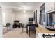 Functional Dining Room features essential appliances, dark table and light tile, offering a practical dining space at 5006 Dantel Way, Stone Mountain, GA 30083