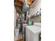 Functional laundry area with washer, dryer, and shelving at 5006 Dantel Way, Stone Mountain, GA 30083