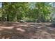 The property features a private backyard with mature trees at 5222 Skyline Dr, Stone Mountain, GA 30083