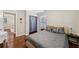 Cozy bedroom with wood floors, neutral walls, and comfortable furnishings at 5222 Skyline Dr, Stone Mountain, GA 30083