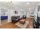 Hardwood floors lead from the living room to the kitchen at 5222 Skyline Dr, Stone Mountain, GA 30083