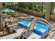 Backyard above-ground pool, surrounded by a deck and outdoor seating, creating a relaxing oasis at 5222 Skyline Dr, Stone Mountain, GA 30083