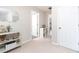 Hallway with neutral colored walls, lots of natural light, and a spacious, airy feel at 59 Creekside Blf, Hiram, GA 30141
