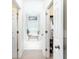 Bright hallway with lots of natural light and closet space with an airy, spacious feel at 59 Creekside Blf, Hiram, GA 30141