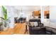 Inviting living area with hardwood floors, adjacent to the dining area and open kitchen at 59 Creekside Blf, Hiram, GA 30141