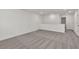 Spacious bonus room with neutral carpet and ample natural light at 1409 Bluffs Ridge Way, Canton, GA 30114