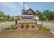 Stone entrance to the Hickory Bluffs community at 1409 Bluffs Ridge Way, Canton, GA 30114