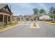 Street view of the Hickory Bluffs community entrance, houses, and landscaping at 1409 Bluffs Ridge Way, Canton, GA 30114