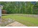 Large backyard with mature tree line at 3705 Tate Pl, Austell, GA 30106