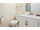 Comfortable bathroom with tile floors and a bright window at 3705 Tate Pl, Austell, GA 30106