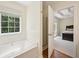 Bathroom view to include shower and soaking tub with view to main bedroom at 3705 Tate Pl, Austell, GA 30106