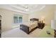 Cozy bedroom with a tray ceiling and ample natural light at 3705 Tate Pl, Austell, GA 30106