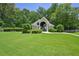 Community clubhouse featuring well-maintained grounds and lush greenery, providing an inviting space for residents at 3705 Tate Pl, Austell, GA 30106