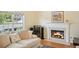 Close-up of the living room fireplace with a modern mantel and decorative artwork at 3705 Tate Pl, Austell, GA 30106
