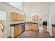 Functional kitchen area with stainless appliances, granite countertops, and an open view to the living area at 3705 Tate Pl, Austell, GA 30106