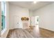 Bright bedroom features light hardwood floors, a fireplace, and an abundance of natural light at 481 Glenwood Se Ave, Atlanta, GA 30312