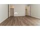 Bright bedroom with vinyl floors, closet, and neutral wall color creates a versatile and inviting atmosphere at 5243 Valleyview Dr, Acworth, GA 30102