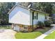 The property is a two-story home with a basement garage and stone foundation at 5243 Valleyview Dr, Acworth, GA 30102