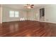 Well-lit living room showcases hardwood floors, neutral walls, and multiple windows offering a bright and airy atmosphere at 5243 Valleyview Dr, Acworth, GA 30102