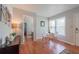 Bright dining area with hardwood floors, a modern table, and plenty of natural light at 2650 Montego Dr, Buford, GA 30519