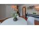 Cozy dining area with hardwood floors, modern decor, and a stylish table setting at 2650 Montego Dr, Buford, GA 30519