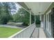 Inviting front porch offering ample space for relaxation and enjoying the outdoor scenery at 2650 Montego Dr, Buford, GA 30519