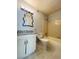 Bathroom with vanity and a tub with tiled surround at 3432 Ivys Walk, Atlanta, GA 30340