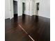 Main bedroom showing entry to closet and bathroom, complete with hardwood floors at 3432 Ivys Walk, Atlanta, GA 30340