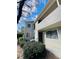 Desirable two-story condo showcasing tidy landscaping and a private covered deck at 3432 Ivys Walk, Atlanta, GA 30340