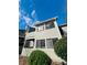 Attractive condo building boasting a covered deck and well-maintained grounds at 3432 Ivys Walk, Atlanta, GA 30340