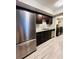 Kitchen features stainless steel appliances, granite countertops and lots of cabinet space for storage at 3432 Ivys Walk, Atlanta, GA 30340