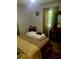 Bedroom featuring neutral walls, window, bed, and curtains at 3629 Centerview Dr, Marietta, GA 30066