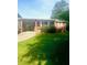 Cozy brick home featuring a covered carport and well-maintained lawn in a peaceful neighborhood setting at 3629 Centerview Dr, Marietta, GA 30066
