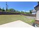 Large, well-maintained backyard surrounded by a wooden fence at 4255 Sunflower Cir, Cumming, GA 30040