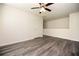 This room features hard wood floors, a ceiling fan, and a neutral color scheme at 4255 Sunflower Cir, Cumming, GA 30040