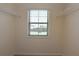 Walk-in closet with white wire shelving and window providing natural light at 4255 Sunflower Cir, Cumming, GA 30040