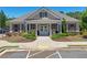 Charming clubhouse featuring manicured landscaping, ample parking, and a welcoming entrance at 4255 Sunflower Cir, Cumming, GA 30040