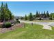Bramblett Grove entrance with lush green grass and trees at 4255 Sunflower Cir, Cumming, GA 30040