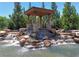 Bramblett Grove fountain featuring waterfalls and a gazebo at 4255 Sunflower Cir, Cumming, GA 30040
