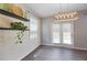 Charming dining area with ample natural light and open shelving for decor display at 4255 Sunflower Cir, Cumming, GA 30040