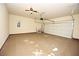 Spacious garage with high ceilings and automatic door opener at 4255 Sunflower Cir, Cumming, GA 30040